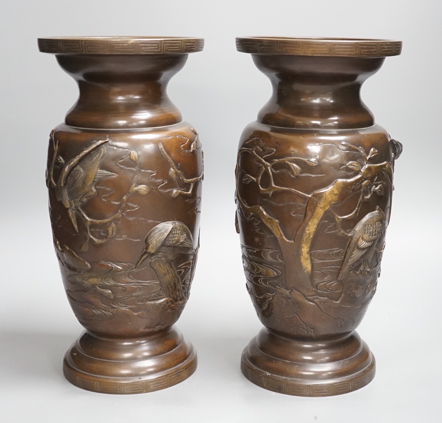 A pair of Japanese bronze vases, Meiji period, 29cms high